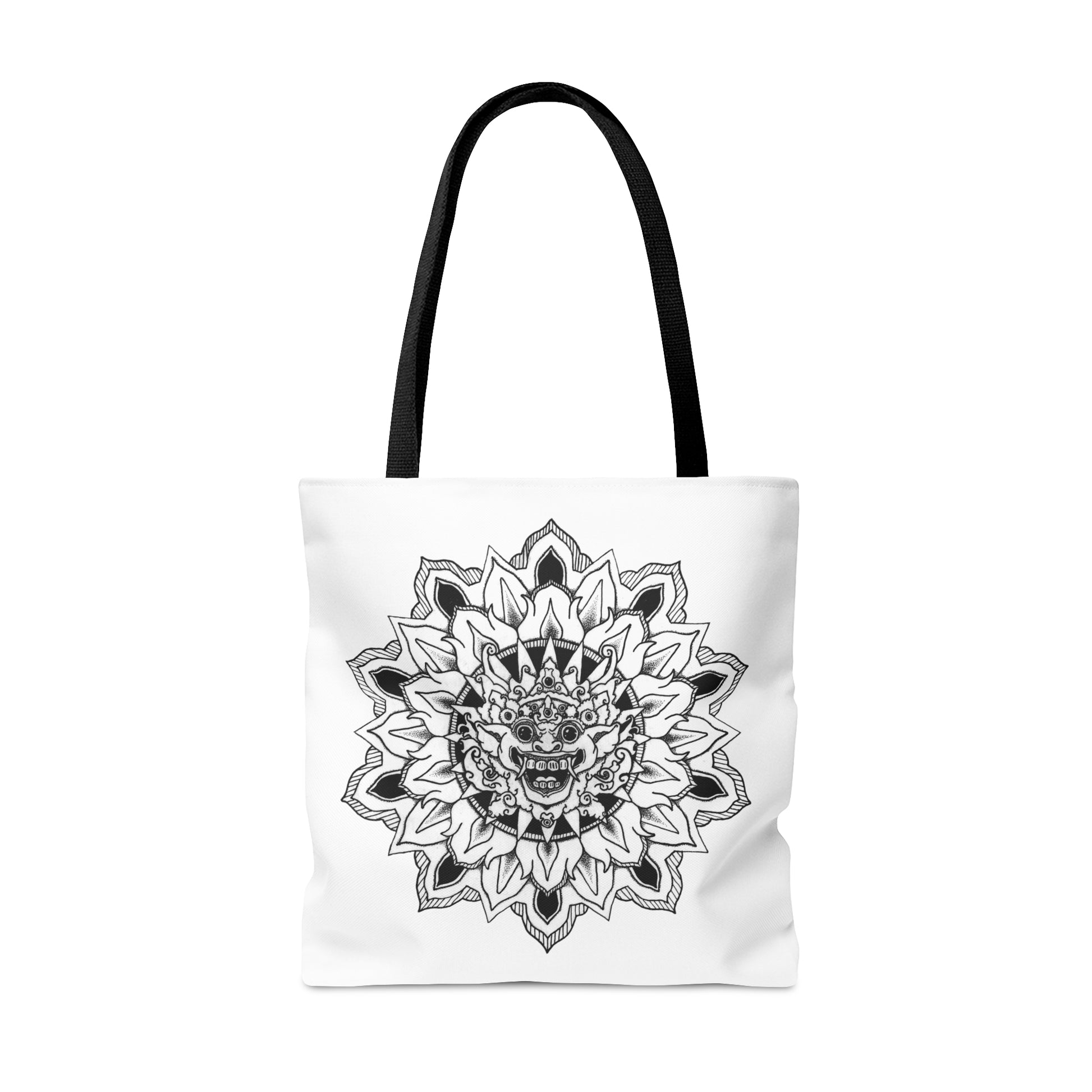 image of a white mandalarian brand tote bag with black handle and black and white bhoma bali god mandala design print on both sides