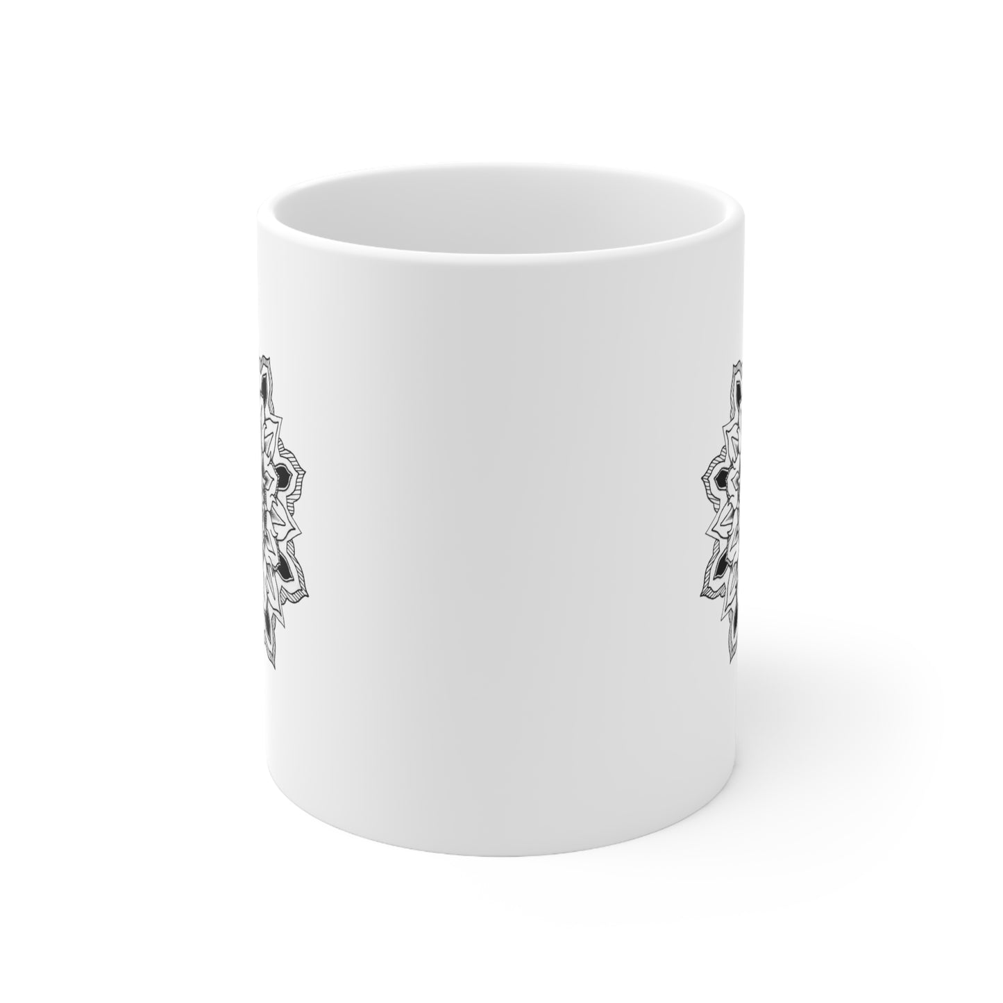 side profile of a white 11oz coffee mug with black bhoma bali god mandala designs on each side