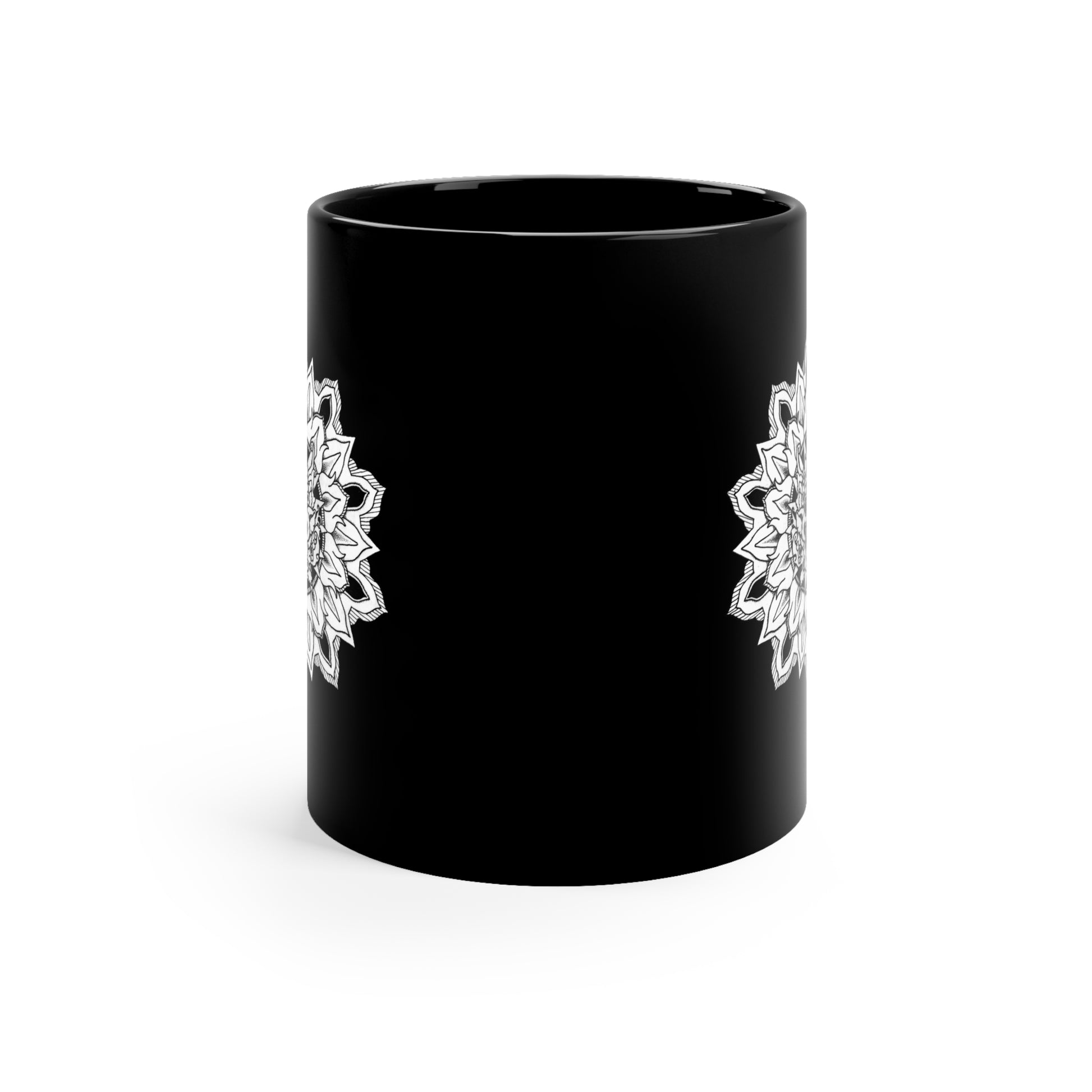 side profile of a  black 11oz coffee mug with white mandala design on both sides