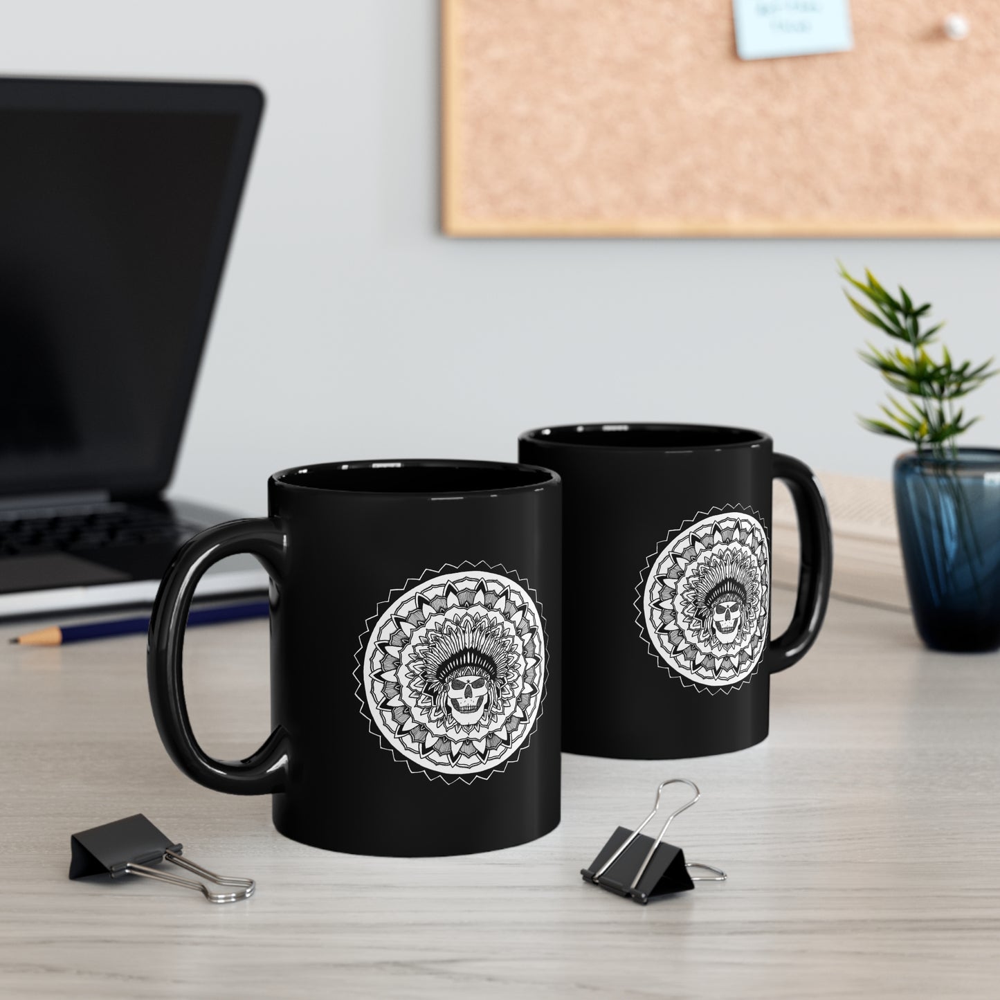 two black 11oz coffee mugs with white chieftain skull mandala designs