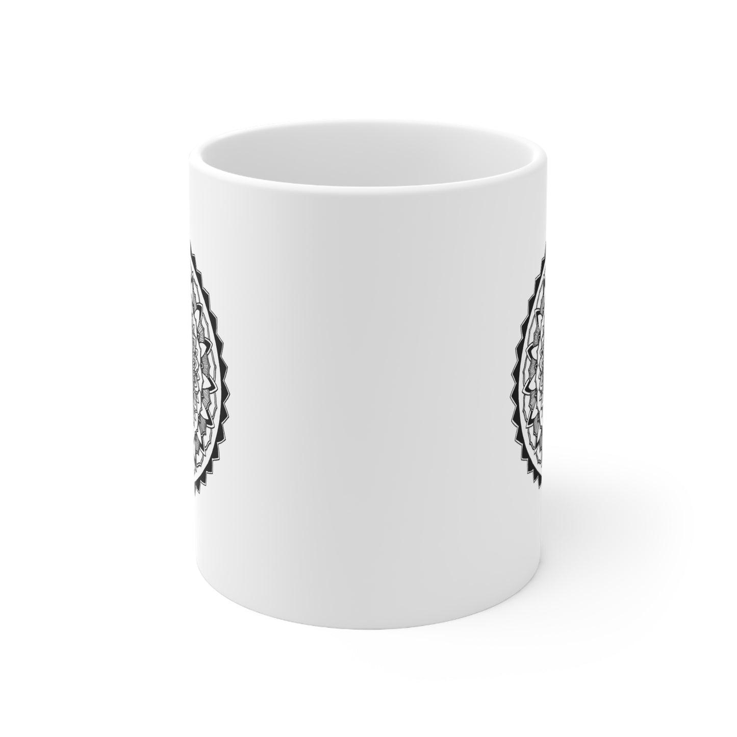 a side profile of a white 11oz coffee mug with mandala designs on both sides