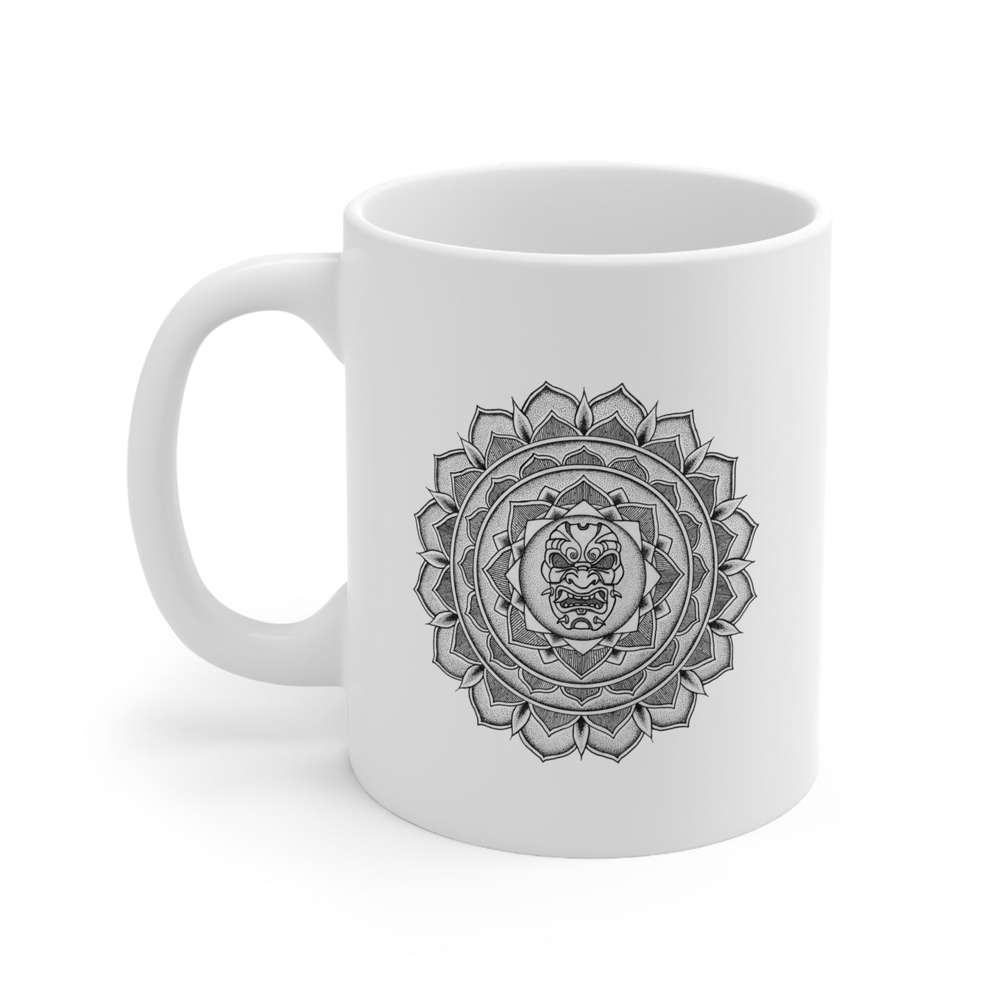 a white 11oz coffee mug with black samurai mask mandala design