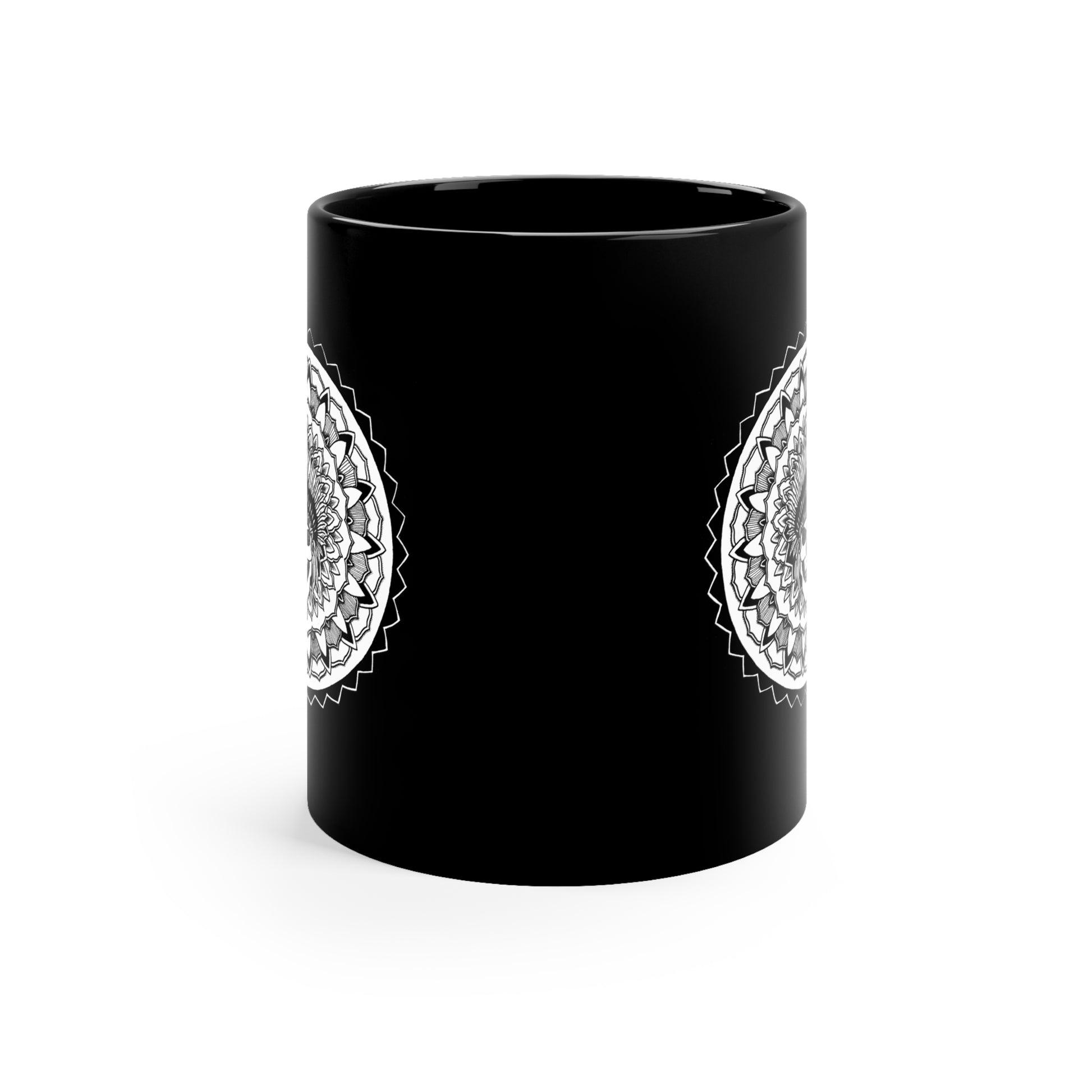 side profile of a black 11oz coffee mug with white chieftain skull mandala design on both sides