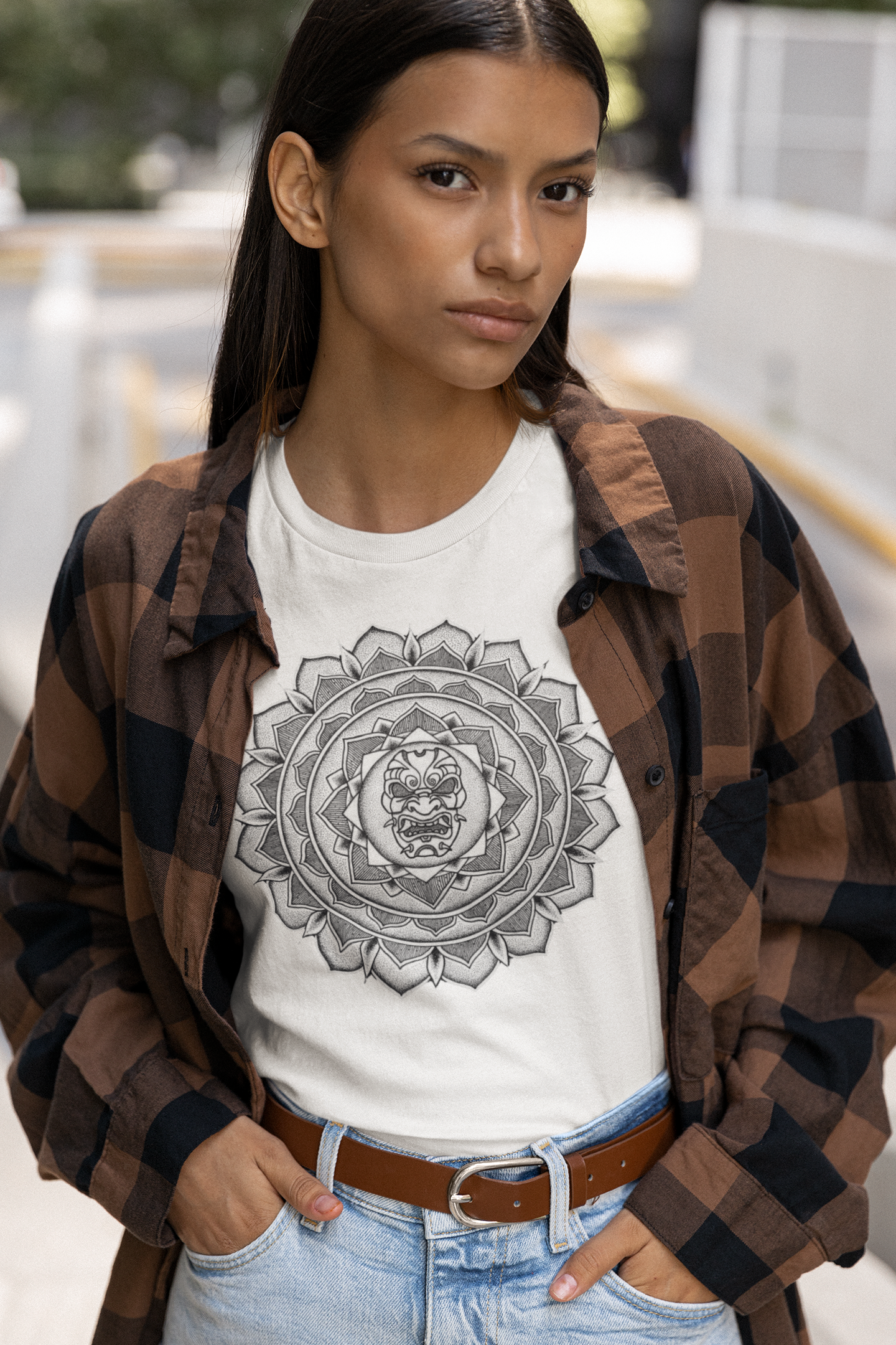 woman wearing a white mandalarian brand samurai mask mandala tattoo design tshirt on the street